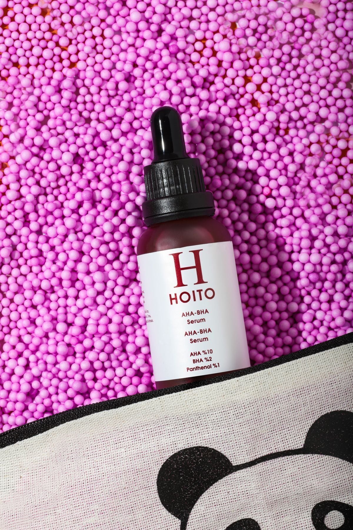 Hoito AHA 10% + BHA 2% Revitalizing Red Peeling Serum is a powerful exfoliating treatment designed to support a smoother, brighter, and more even-looking complexion.