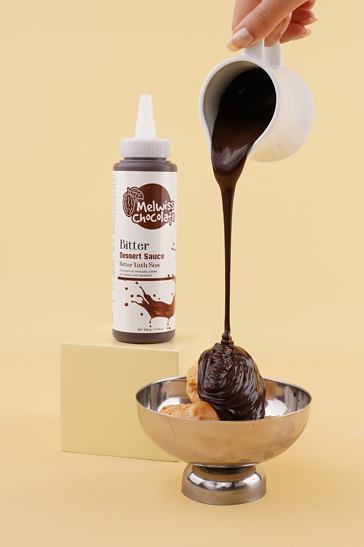 Meet your new favorite dessert topping: Melwiss Chocolate Dark Sweet Sauce.