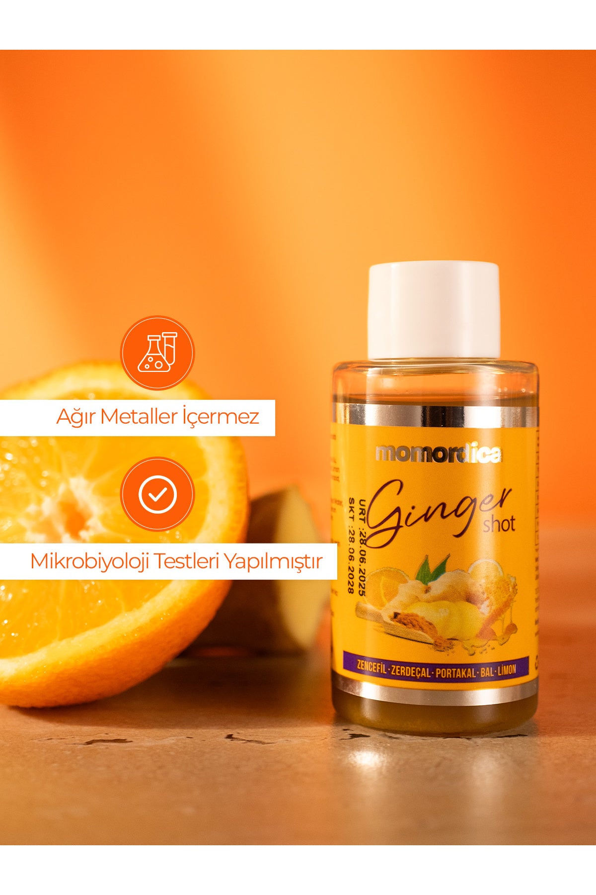 MOMORDICA Ginger Shot is a convenient liquid blend featuring Ginger (Zingiber officinale), Turmeric (Curcuma longa), Orange, Lemon, Honey, and Black Pepper (Piper nigrum).
