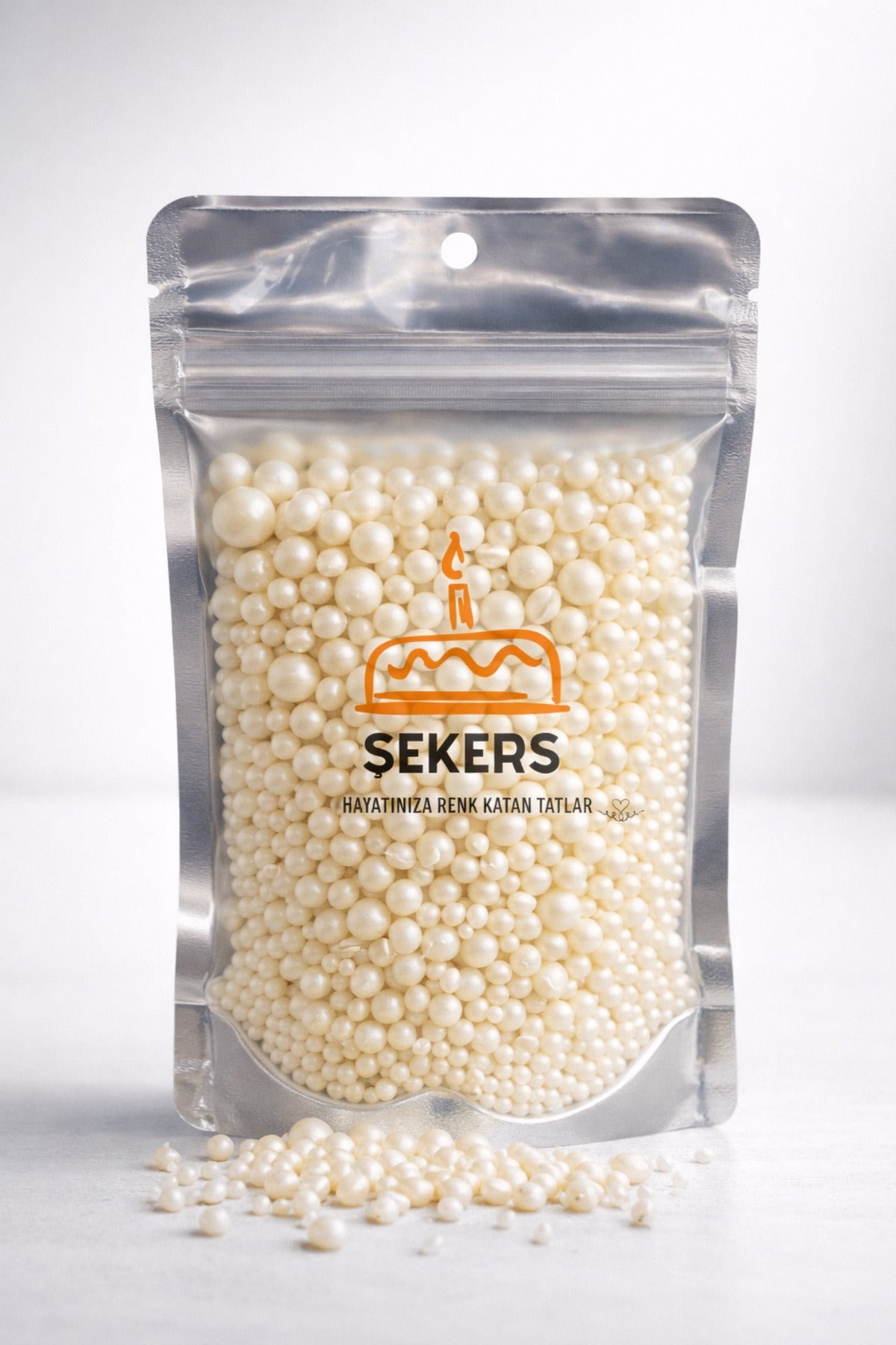 Add refined sparkle to your desserts with Sekers Hayatiniza Renk Katan Tatlar Premium Mix Decorative Sugar Pearls.