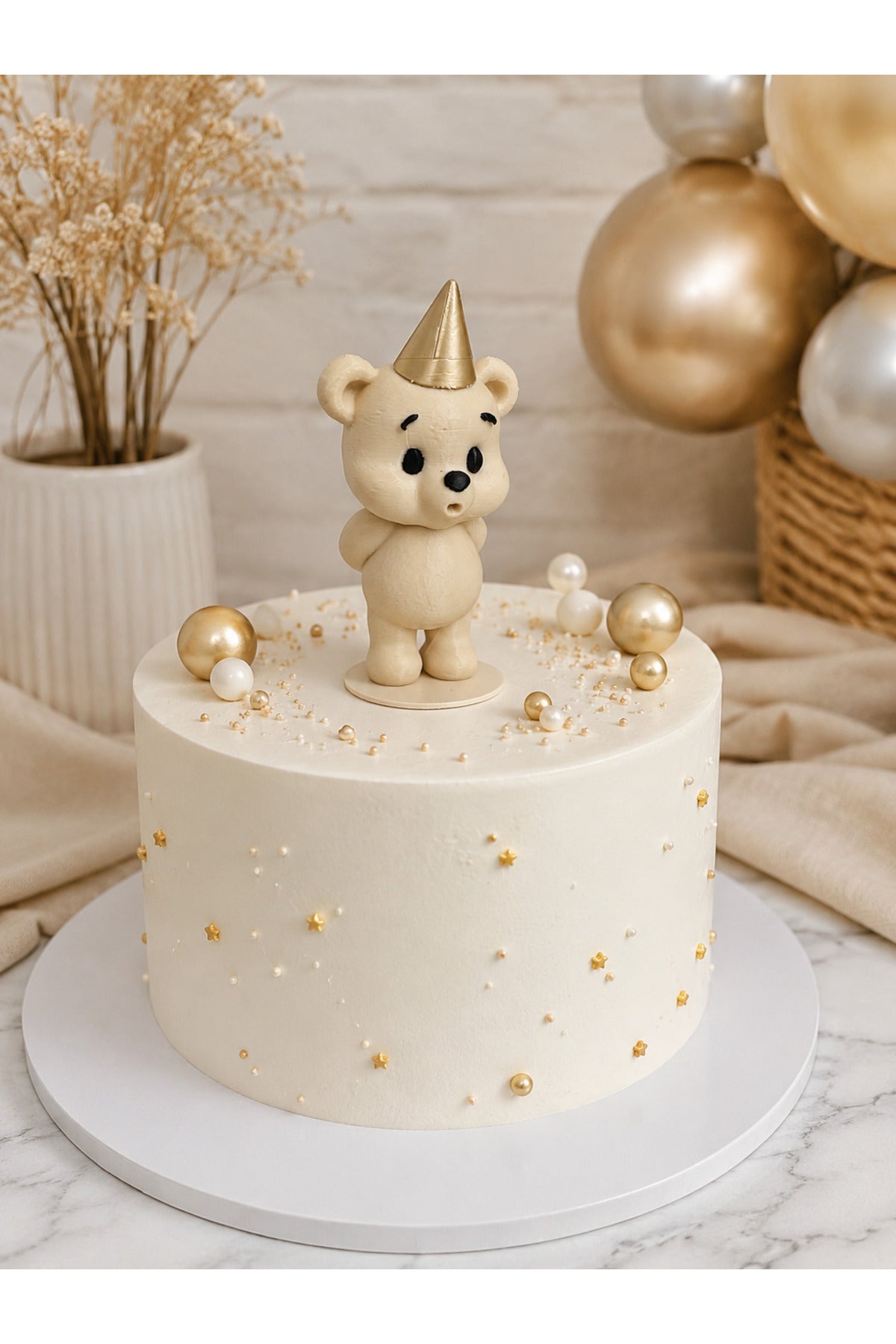 Add a sweet and stylish touch to your celebrations with the Chubby Bear Cake Topper featuring a charming gold party hat.
