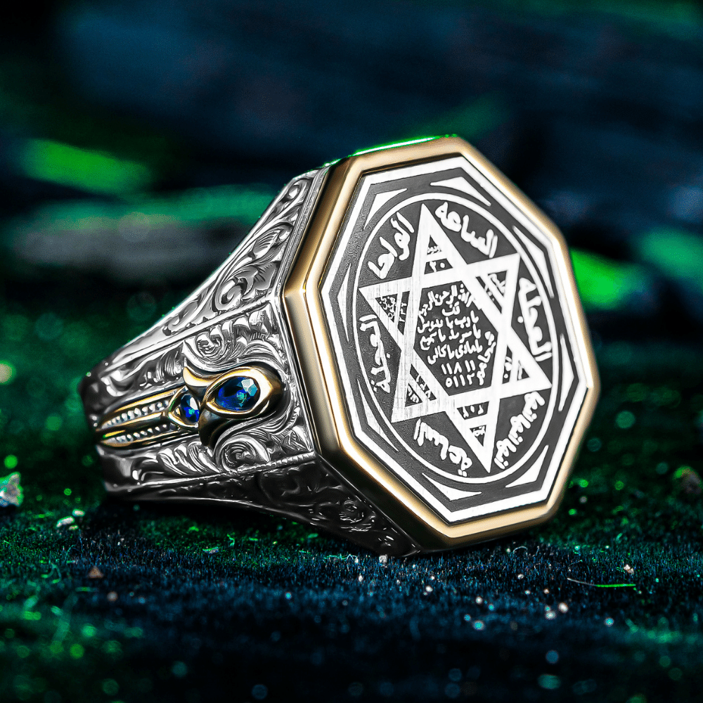 Crafted from solid 925 Sterling Silver, this Turkish Sterling Silver Ring with Blue Suleiman Seal features intricate engraved detailing and a striking blue stone accent at its center.