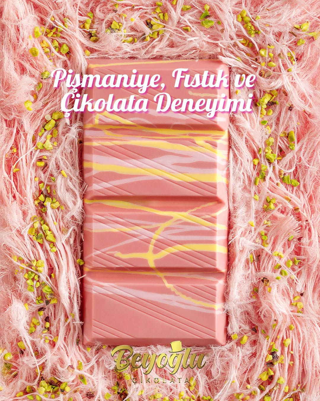 Pink Angel Hair chocolate bar with decorative elements on a pink background