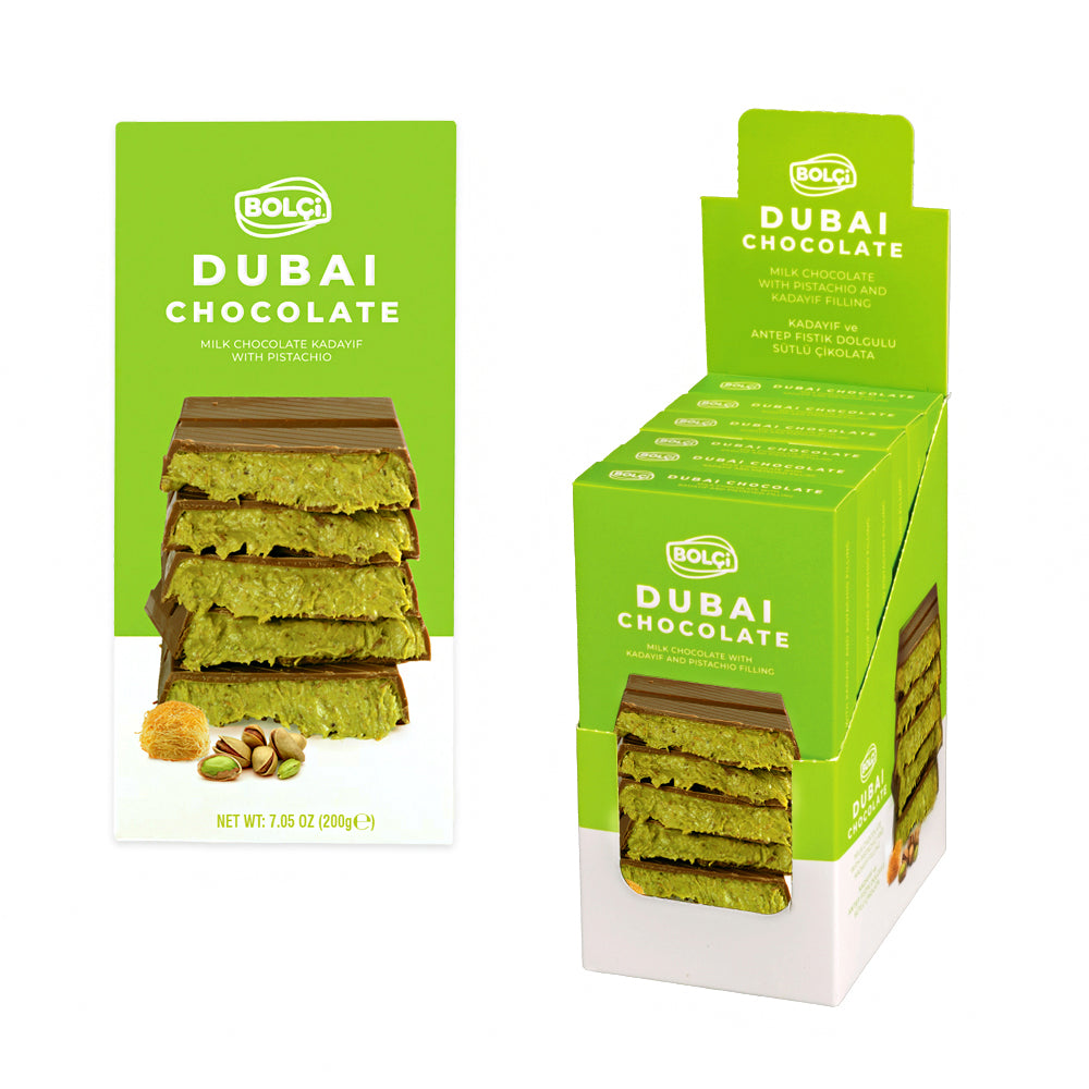 Bolci Dubai Milk Chocolate with Pistachio & Crispy Kadaif Filling brings together the smoothness of premium milk chocolate with the irresistible crunch of roasted kadaif and the nutty flavor of Antep pistachios. Every bite offers a perfect harmony of textures and tastes—creamy, crunchy, and delicately sweet