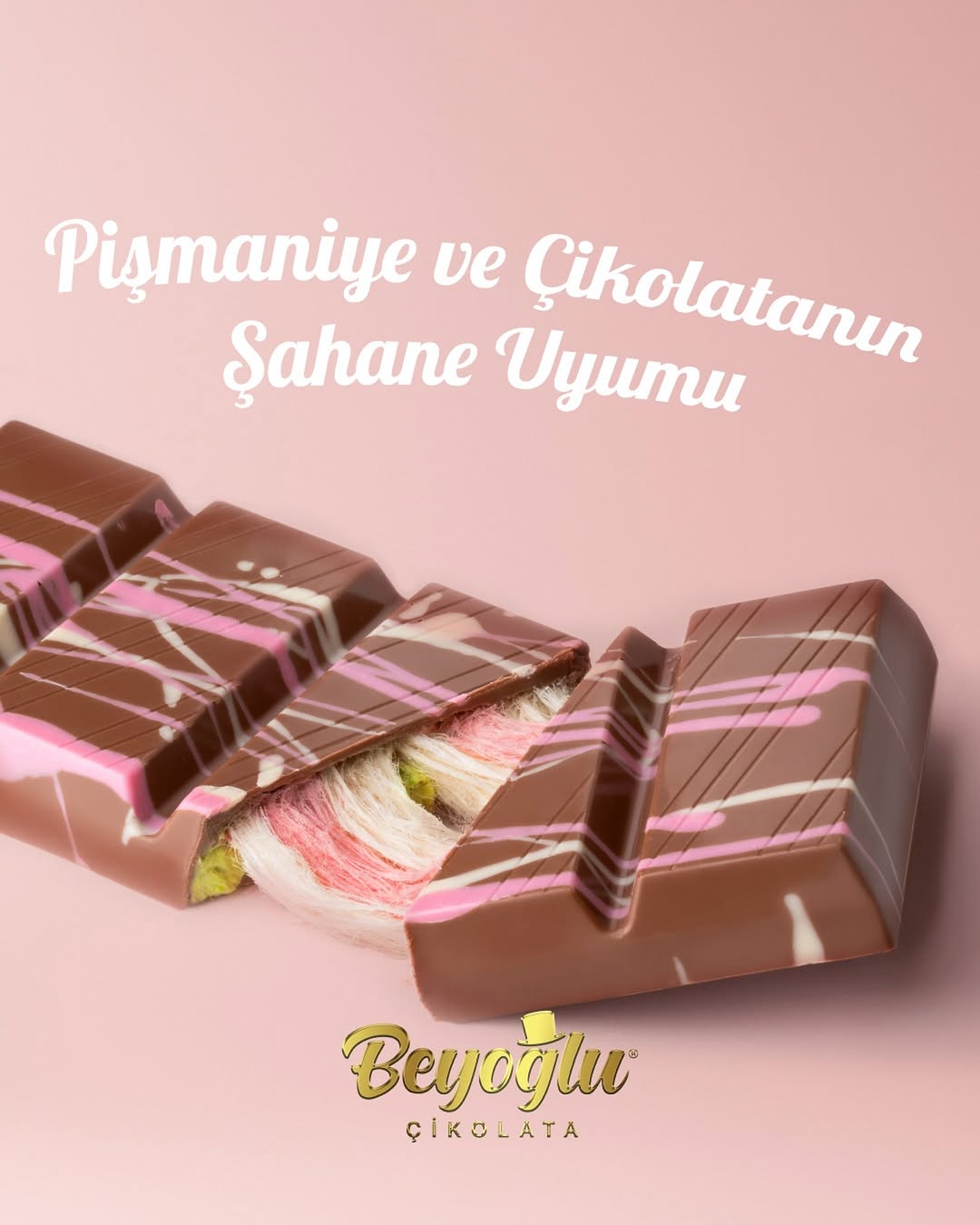 A slice of Beyoglu Angel Hair Raspberry White Chocolate, highlighting the unique texture and colorful layers inside