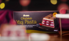 Slice of layered dessert on a plate with a box of Ulker Cikolatali Yas Pasta in the background. Ulker Milk Chocolate Cake with Velvety Red Velvet Base and Forest Berry Sauce – 13.9 oz (395 G)
