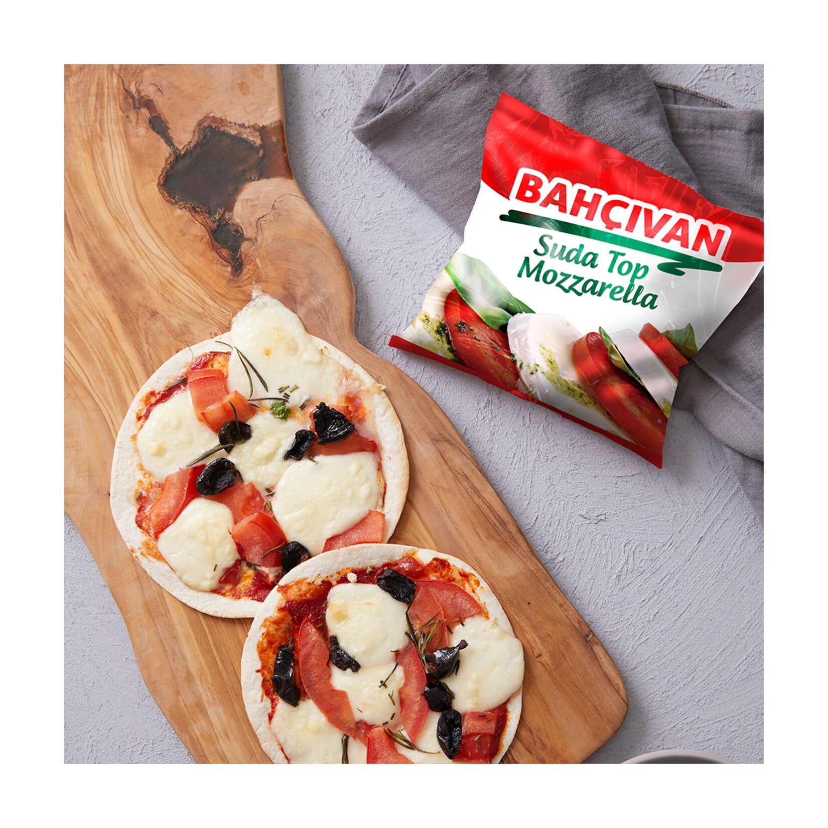 Bahçıvan Suda Top Mozzarella is a soft, fresh mozzarella cheese stored in brine to preserve its delicate texture and mild, milky flavor.