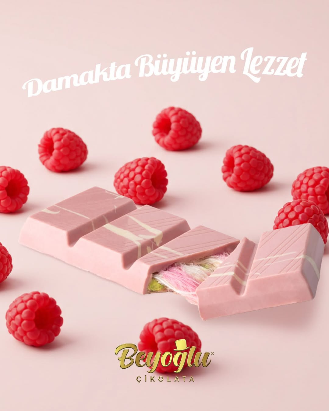 A slice of Beyoglu Angel Hair Raspberry White Chocolate, highlighting the unique texture and colorful layers inside