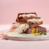 Box of Beyoglu Sweet Angel Hair chocolate with cotton candy and pistachio cream on a white background