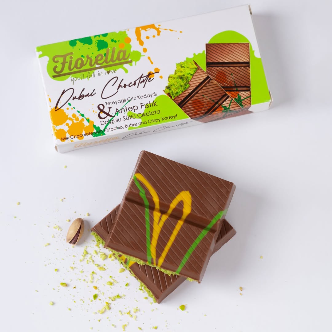 Fiorella Dubai Chocolate Bar Cut in Half, Revealing Buttery Kadayif and Pistachio Filling
