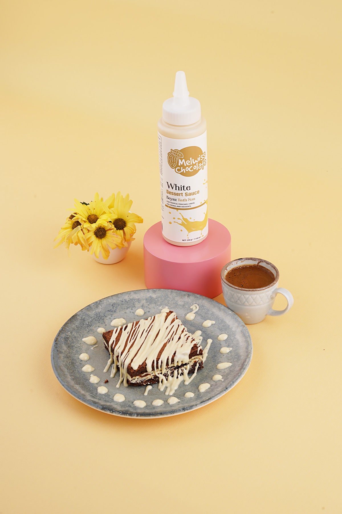 Discover a new way to top your favorite desserts with Melwiss Chocolate White Sweet Sauce.