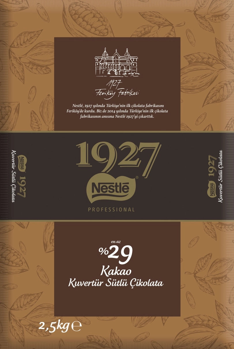 Nestle 1927 Milk Couverture Chocolate is a professional-grade chocolate block crafted for bakeries, pastry chefs, and serious home bakers who want consistent, premium results.