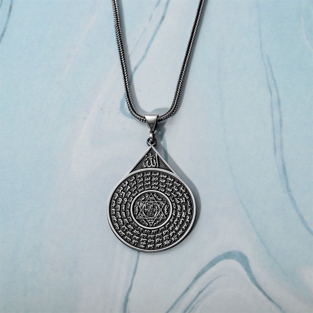 Rooted in centuries of Islamic art and symbolism, this Turkish Sterling Silver Necklace with Seal of Solomon features the revered Seal of Prophet Suleiman motif intricately engraved with references to the Asma ul Husna (the Beautiful Names of Allah).