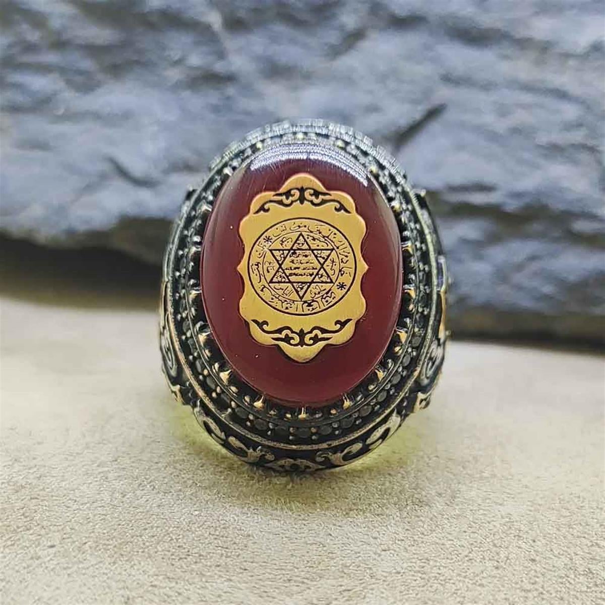 Turkish Sterling Silver Ring with Red Amber and Seal of Solomon is a bold statement piece inspired by traditional Ottoman design.