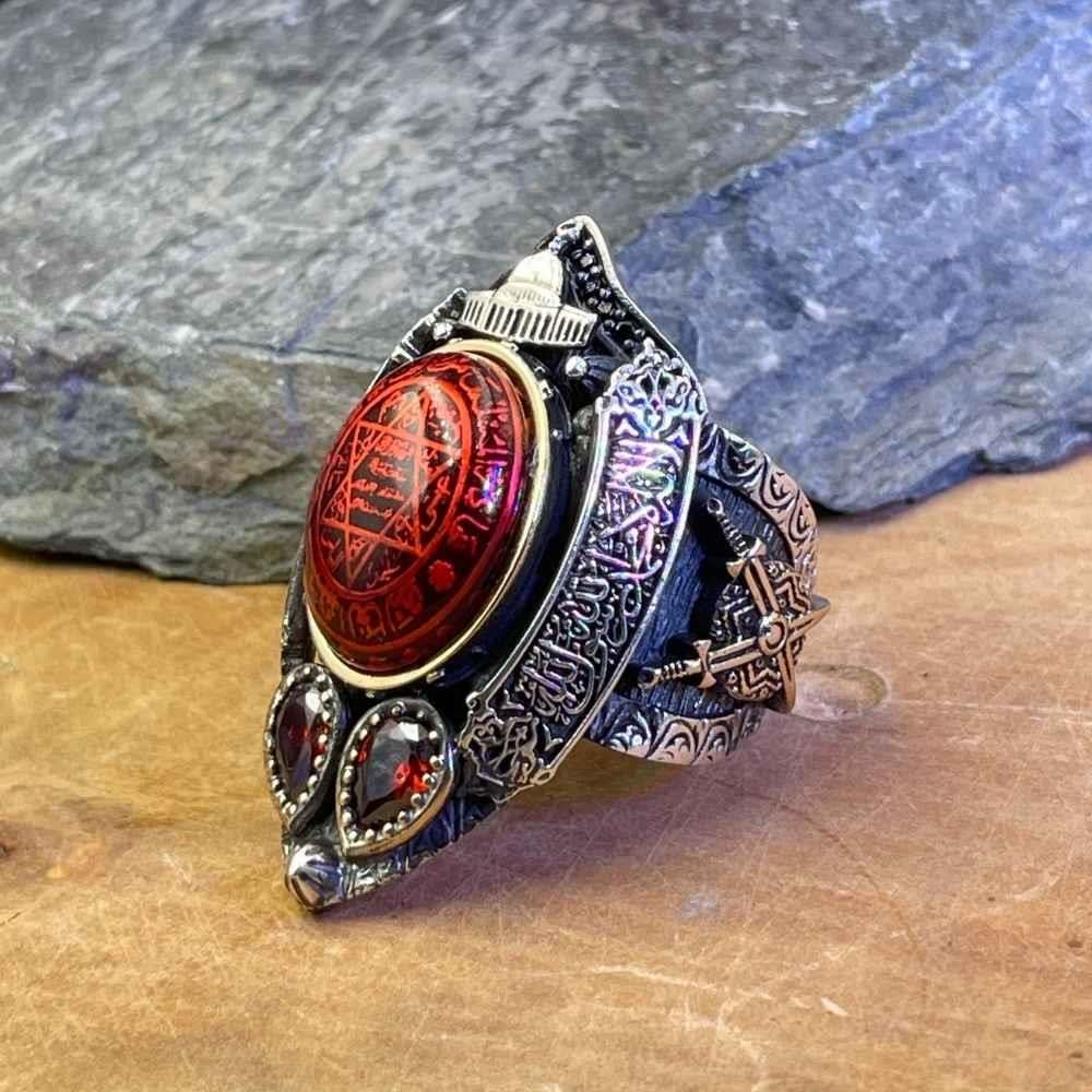Turkish Sterling Silver Zihgir Ring with Red Amber is a bold statement piece inspired by Ottoman archery heritage and rich Islamic artistry.