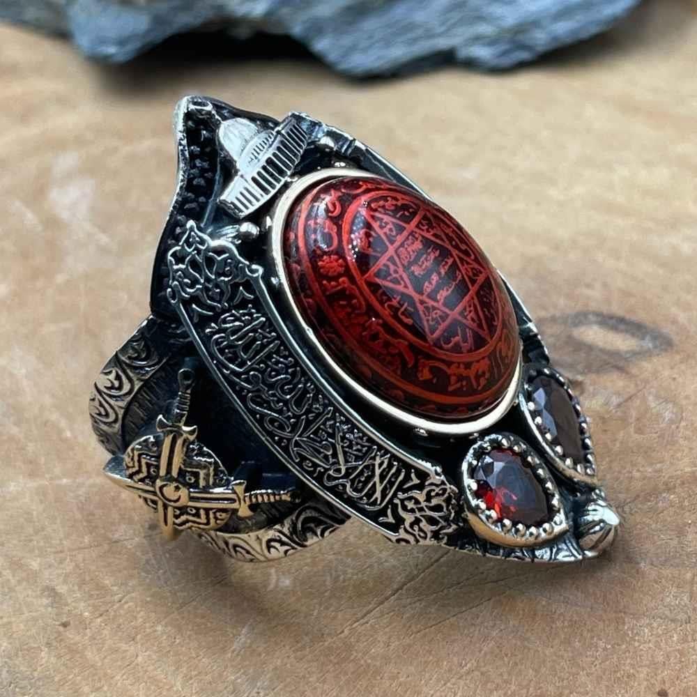 Turkish Sterling Silver Zihgir Ring with Red Amber is a bold statement piece inspired by Ottoman archery heritage and rich Islamic artistry.