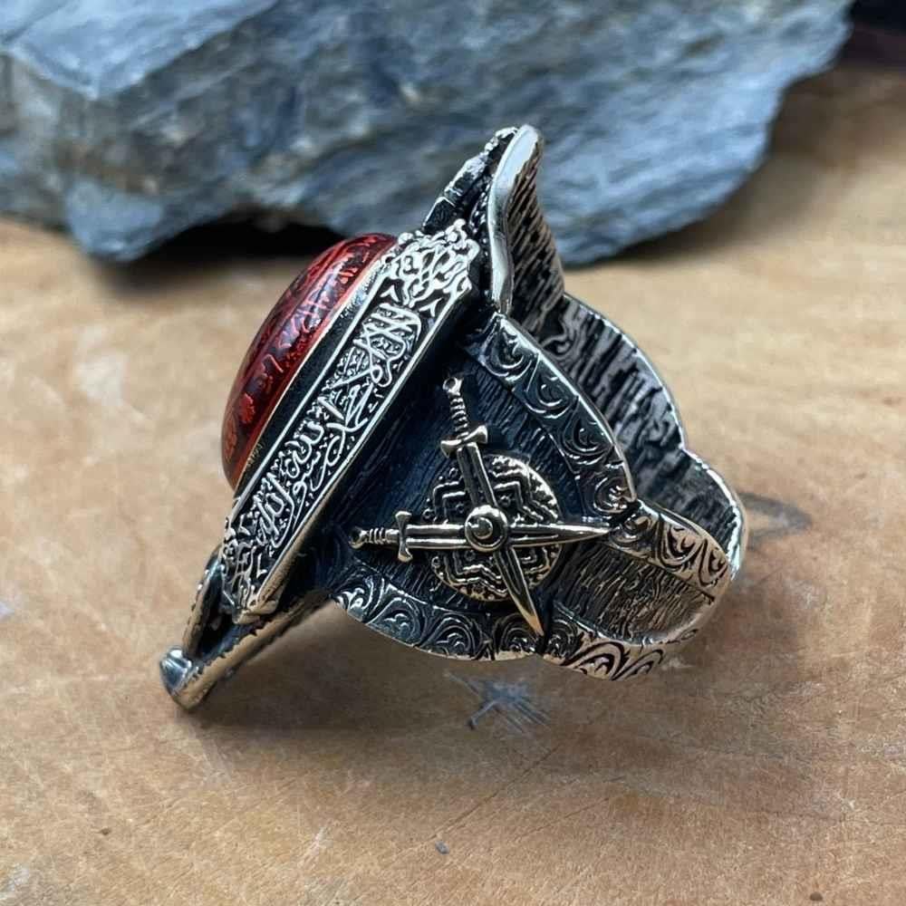 Turkish Sterling Silver Zihgir Ring with Red Amber is a bold statement piece inspired by Ottoman archery heritage and rich Islamic artistry.